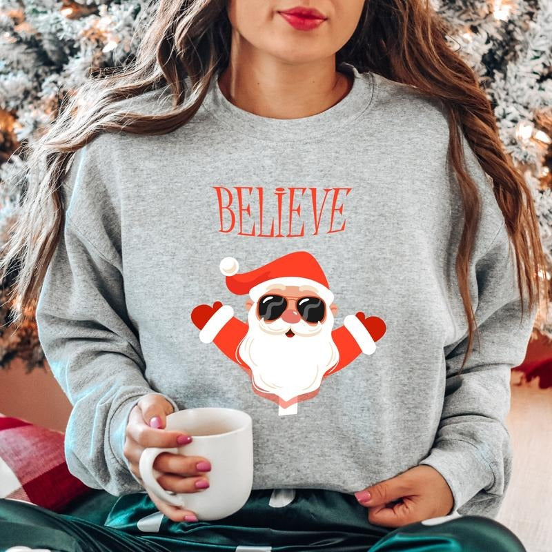 Believe Sweatshirt, Christmas Believe Hoodie, Cute Xmas Celebration Gift Sweater, Unisex Santa Hoodie, Winter Season...