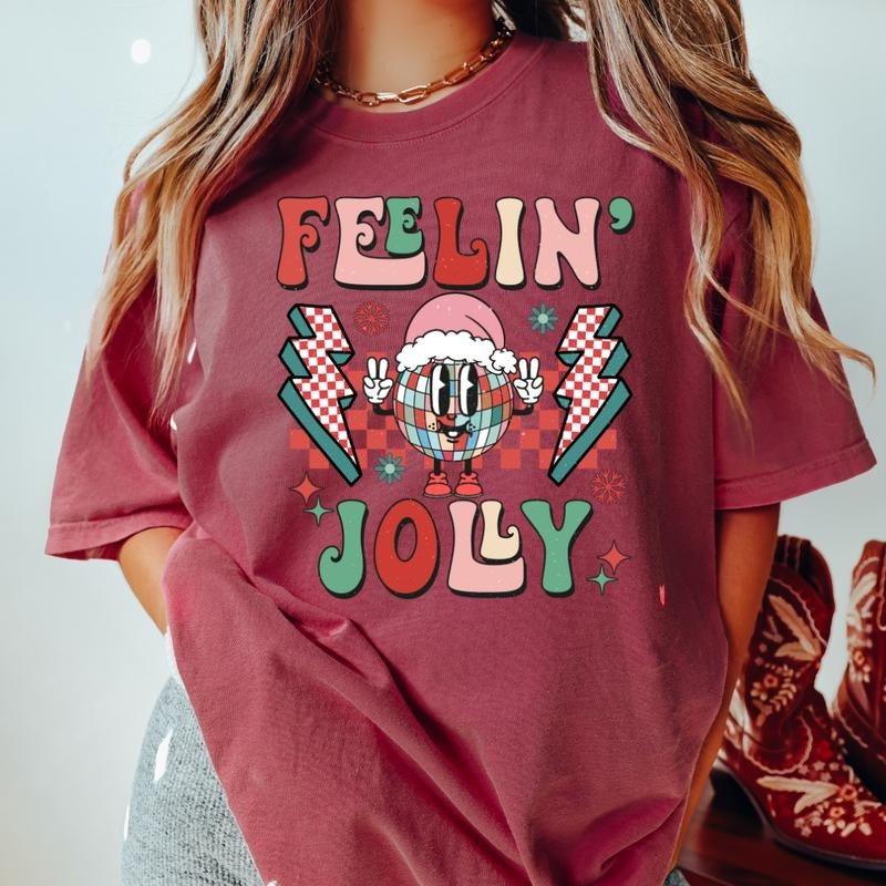 FEELIN JOLLY DISCO T-SHIRT (COMFORT COLORS T-SHIRT, CASUAL SHIRT UNISEX, CHRISTMAS CLOTHING, GRAPHIC APPAREL, HOLIDAY SHIRT) Cotton Fabric