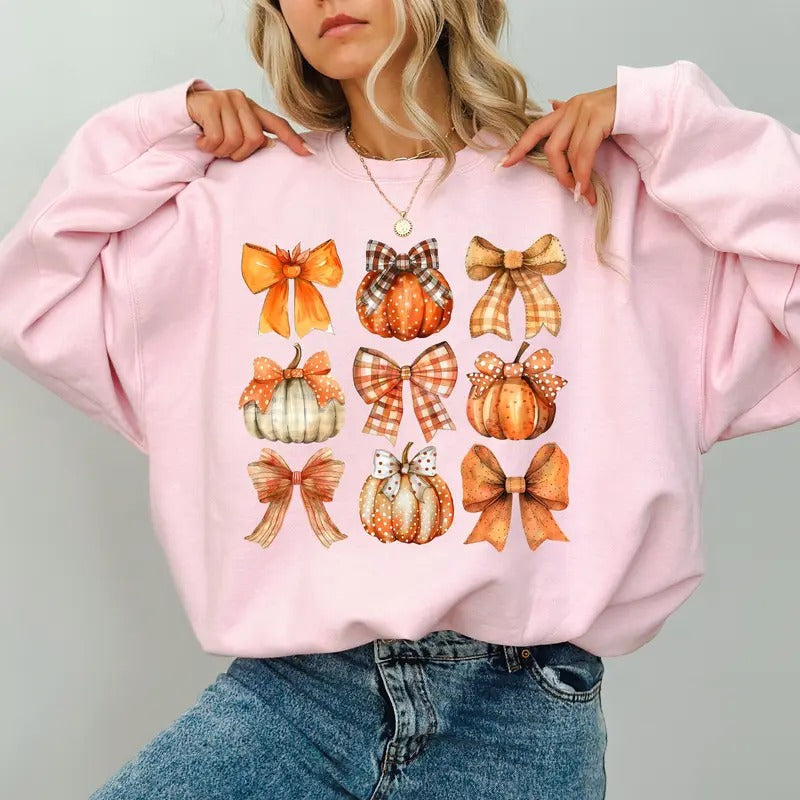 Fall Coquette Bow Pumpkin Sweatshirt, Vintage Pumpkin Bow Crewneck For Girls, Girly Fall Pumpkin Sweater, Cute Coquette Pumpkin Crewneck, Spooky Season Outfits, Comfy Long Sleeve Pullover, Cute Women's Tops, Casual Womenswear, Comfort Fabric Cotton Top