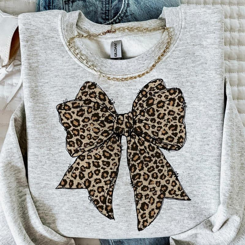 Leopard Coquette Bow Crewneck Shirt, Girly Bow Trending, Cheetah Bow Girl Hoodie, Sweatshirt | InkThreadWorks.com