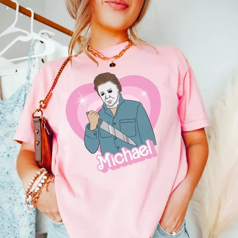 Michael doll tshirt, horror movie doll tshirt, funny Halloween graphic tee, pink spooky shirt, retro aesthetic, scary characters Valentines