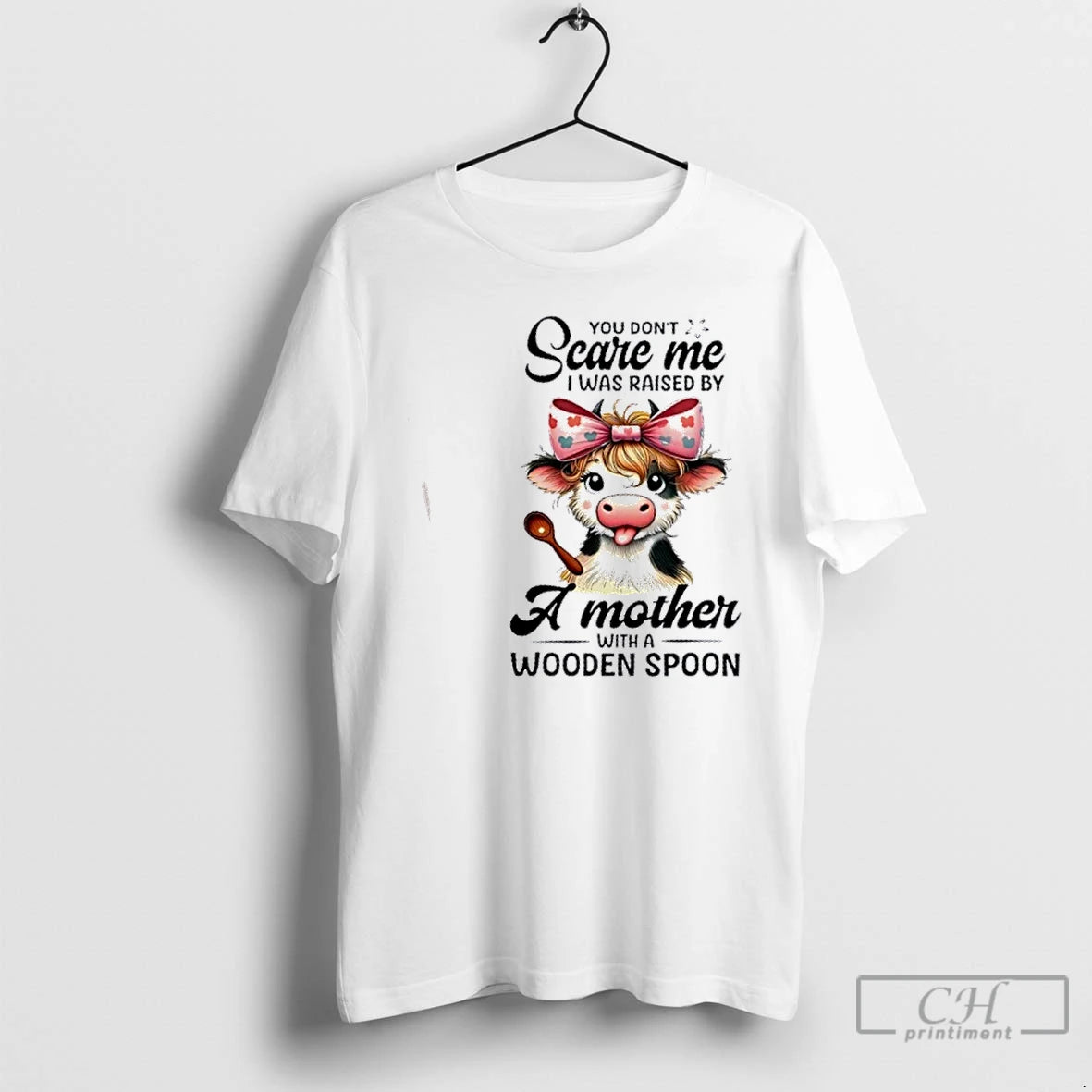 Premium Cow You Dont Scare Me I Was Raised By A Mother With A Wooden T-Shirts, Hoodie, Sweatshirt | InkThreadWorks.com