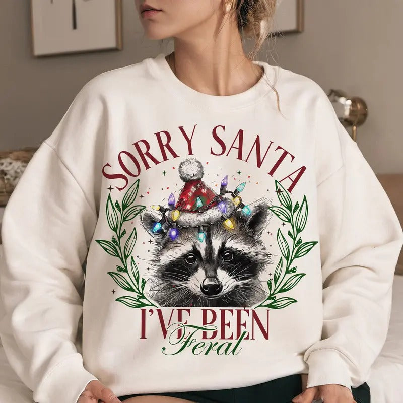 Sorry Santa I've Been Feral Christmas Season Sweatshirt, Funny Christmas Feral Girl Shirt Hoodie | InkThreadWorks.com