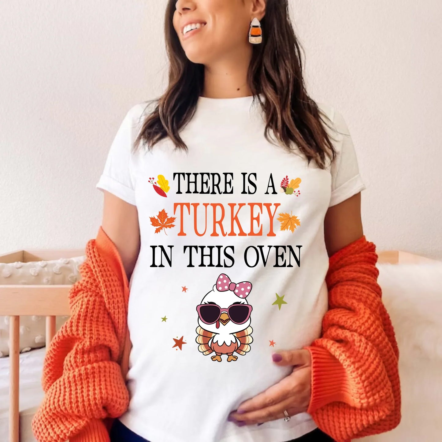 "There Is a Turkey in This Oven” Maternity T-Shirt – Funny Thanksgiving Pregnancy Announcement Hoodie, Sweatshirt (Image 1)