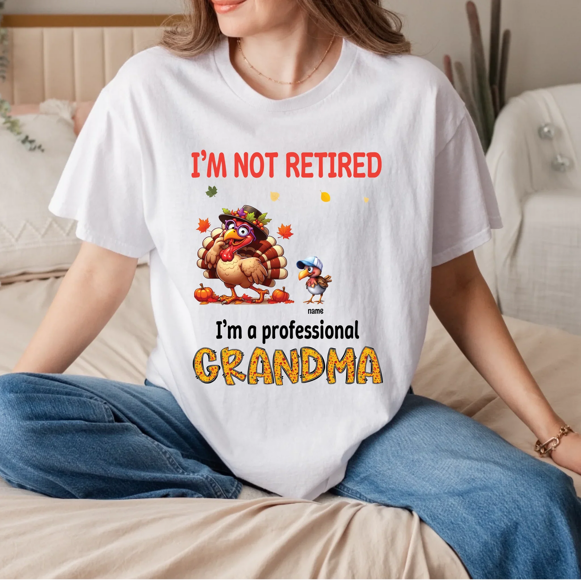 Personalized “I’m Not Retired, I’m a Professional Grandma” Thanksgiving Shirt – Custom Grandkids Names – Funny... (Image 1)