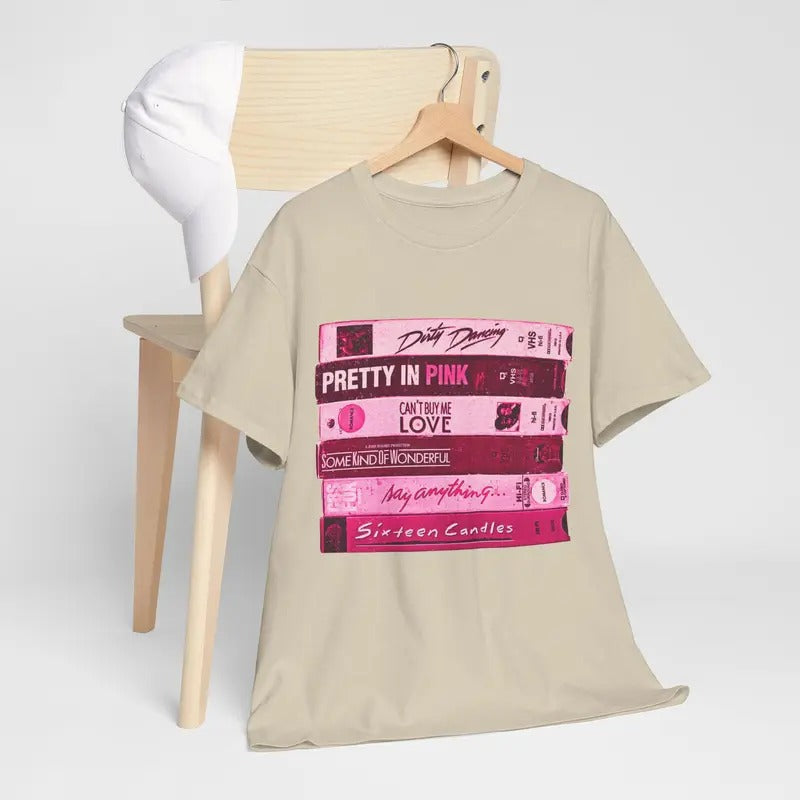 80s Rom Com Movies Unisex T-Shirt, Romance of the 1980s in Pink Colors, Love stories VHS Tapes Pretty in Pink Dirty Dancing Sixteen Candles Cotton Womenswear Comfort Fabric