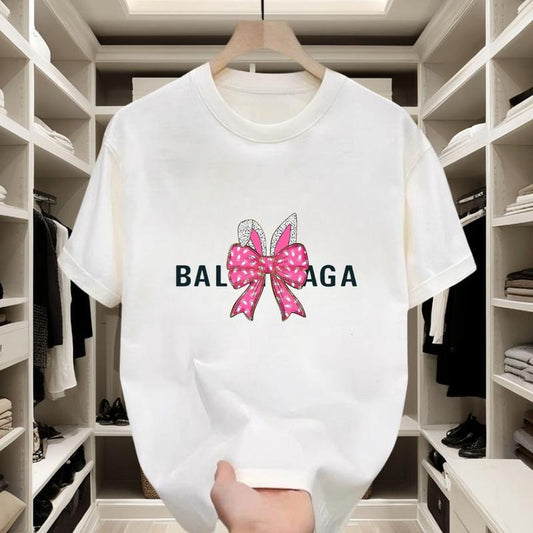 Black and white T-shirts with pink polka-dot bows and diamond-like decorations. Made of pure cotton for comfort, they are...