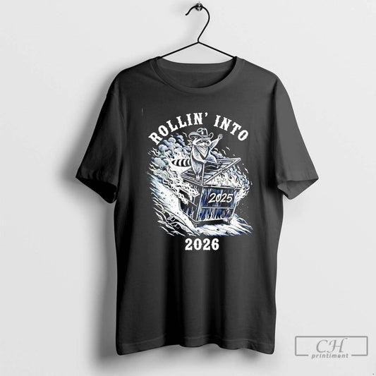 Classic Rollin Into 2026 Raccoon Dumpster Fire T-Shirts, Hoodie, Sweatshirt | InkThreadWorks.com