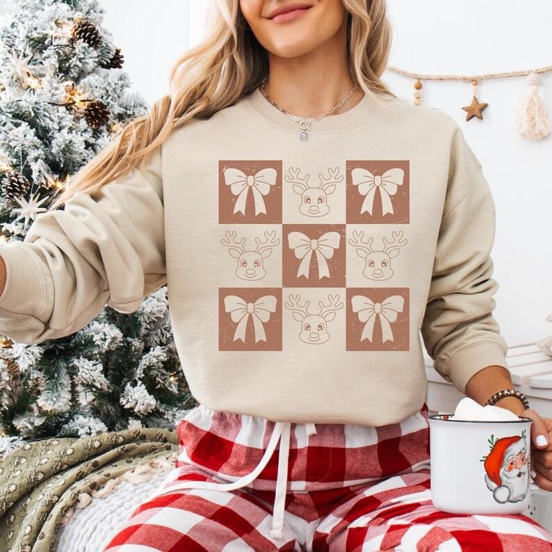 Coquette Bow Reindeer Christmas Sweatshirt, Checkered Reindeer T-shirt, Vintage Christmas Shirt, Christmas Vibes Hoodie, Reindeer Lover Gift