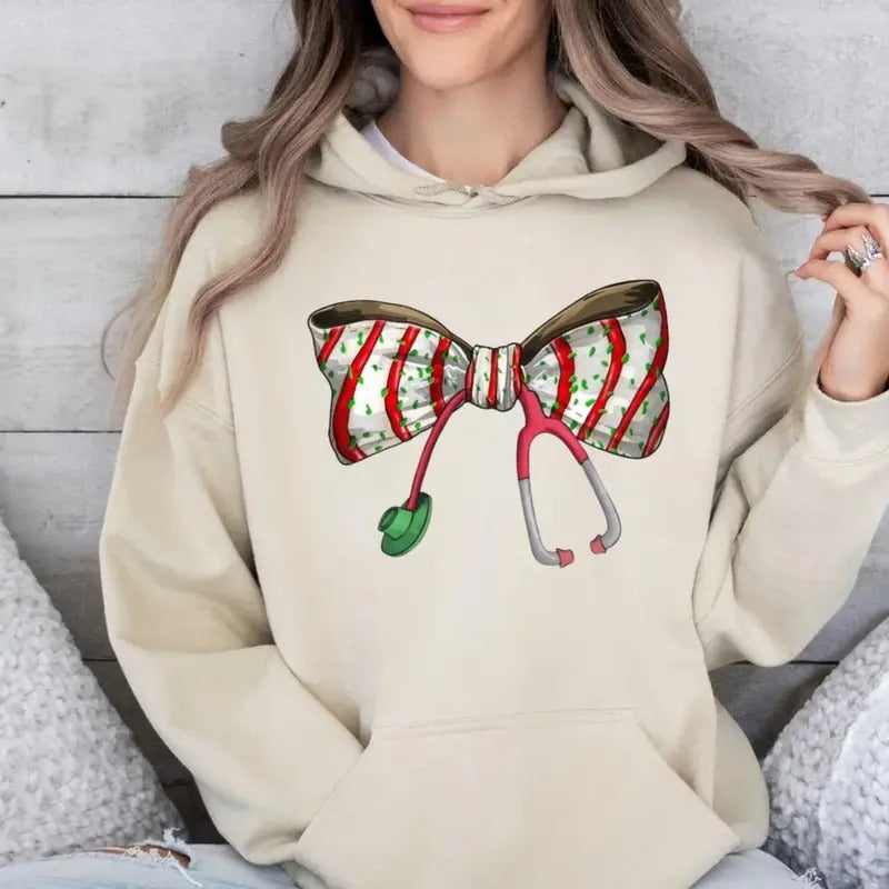 Coquette Nurse Stethoscope Sweatshirt, Cute Bow Nurse Christmas Shirt, Gift For Nurses, Holiday Medical Hoodie, Unisex...