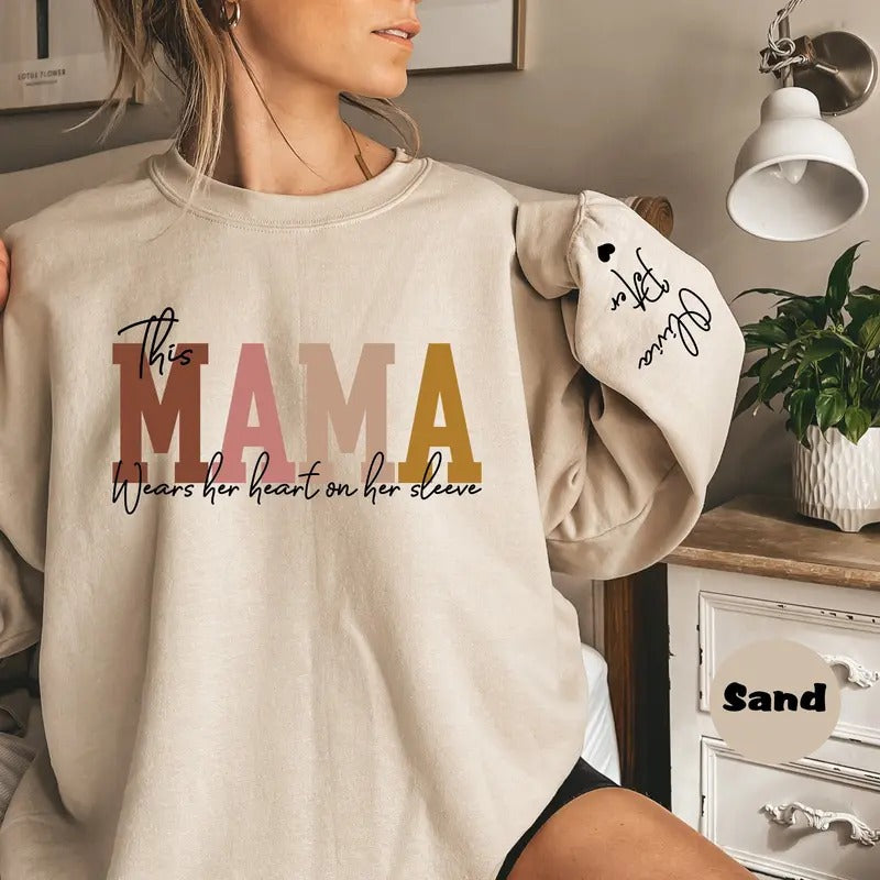 Custom This Mama Wears Her Heart On Her Sleeve Sweatshirt, Personalized Mom Sweatshirt With Kids Names, Cute Momma...