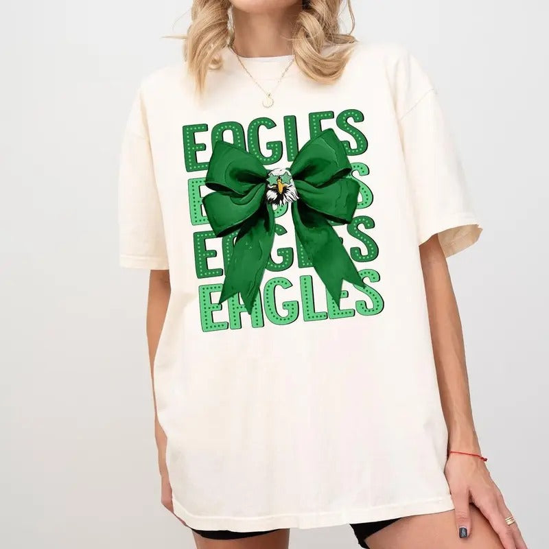 Football Team Shirt, Coquette Bow School Spirit Shirt, Mascot Game Day Shirt, Football Team Shirt, Cheer Mascot Team Shirt, Sport Mom Shirt, Gifts For Football Lover, Gifts For Mom, Cotton Fabric Shirt, Sporty Crewneck Tshirt Womenswear, shirt trend 2025