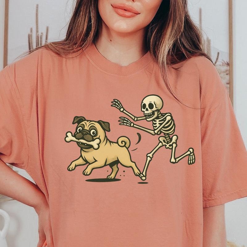 Funny Skeleton Chasing PUG Dog Halloween T-Shirt | Spooky Graphic Tee Comfort Colors Style 100% Ring-Spun Cotton Unisex...
