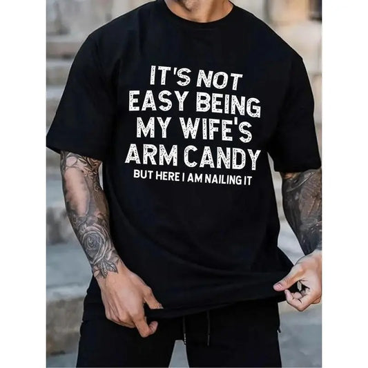 It's Not Easy Being My Wife's Arm Candy But Here I Am Nailing It T-Shirt, Funny Saying Sweatshirt and Hoodies, Men's Top for Daily Wear