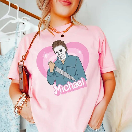 Michael doll tshirt, horror movie doll tshirt, funny Halloween graphic tee, pink spooky shirt, retro aesthetic, scary characters Valentines