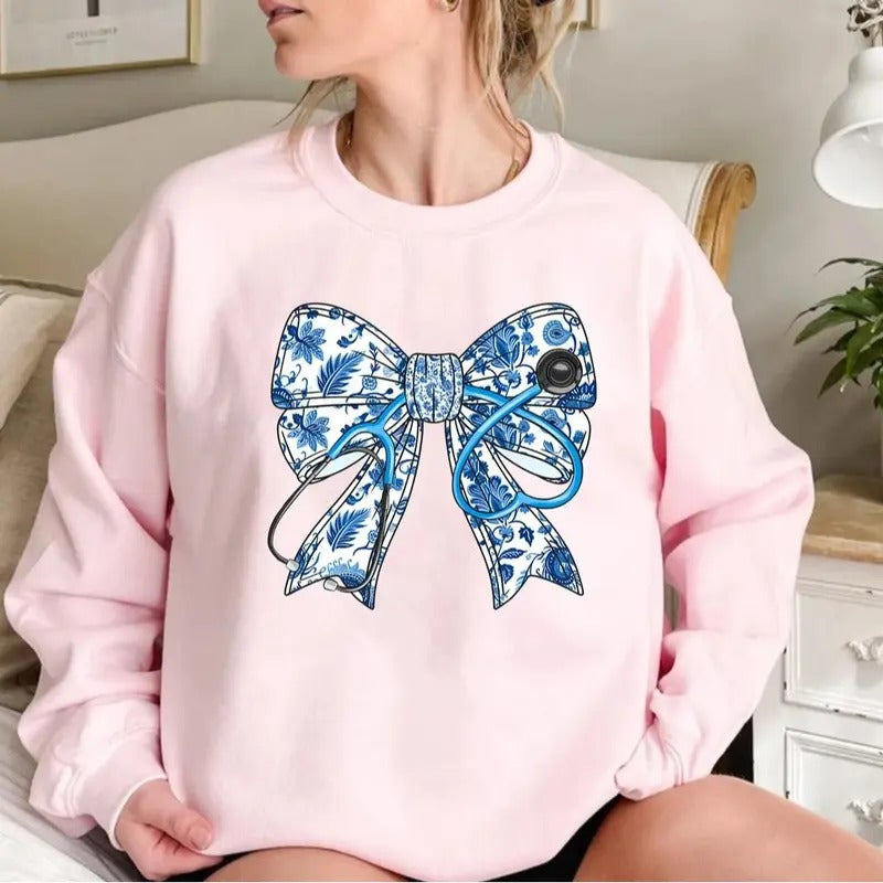 Nurse Stethoscope Bow Sweatshirt, Blue Ribbon Shirt For Nurses, Nurse Life, Christmas Nurse Gift, Unisex Shirt, Gift For...