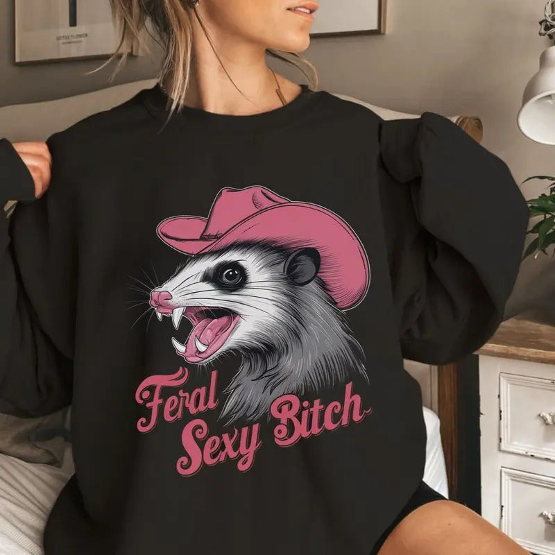 Pink Cowgirl Feral Opossum Sexy Btch Shirt, Funny Feral Girl Sweatshirt, Full Sizes, Full Colors Hoodie | InkThreadWorks.com
