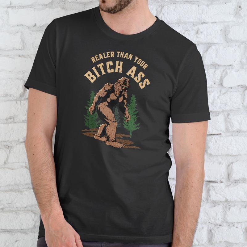 REALER THAN YOUR BIGFOOT T-Shirt Unisex Cotton Graphic Tee Medium Size Bold Eye-Catching Design Soft Comfortable Everyday Wear