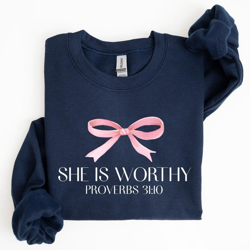 She Is Worthy, Bible Verse, Christmas, Bow, Pink, Proverbs, Soft Girl Era Sweatshirt, Women's Crew Neck, Crewneck...