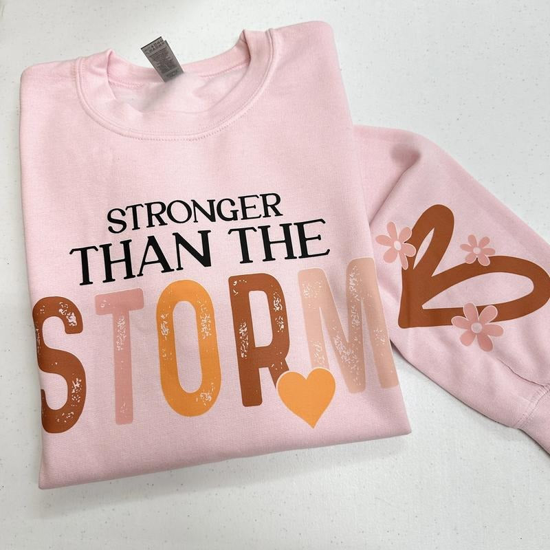 Stronger Than The Storm Gildan Sweatshirt -- LIGHT PINK T-Shirts, Hoodie | InkThreadWorks.com