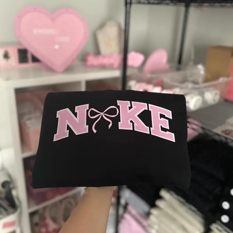 Women's Pink Bow Pullover Hoodie,Sweatshirt , t shirt, Medium-Heavy Fabric, Loose Fit Womenswear Tops | InkThreadWorks.com