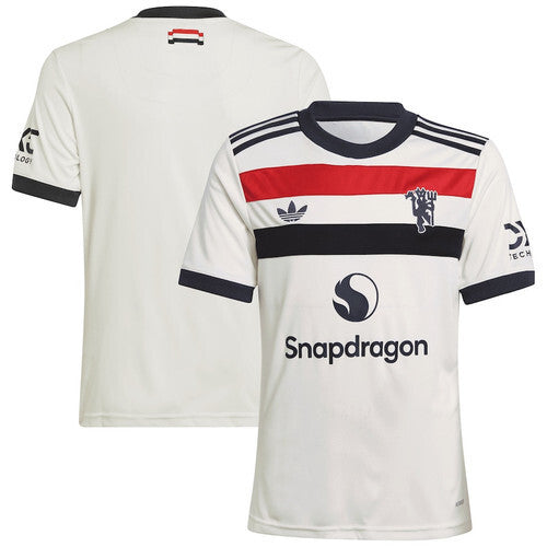 Youth Manchester United 202425 Third Jersey - Cream